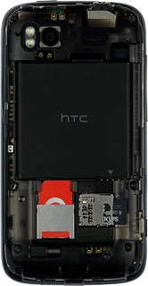 Turn the memory card so the contacts on the card are facing downwards.Slide the memory card into the holder until it clicks into place.