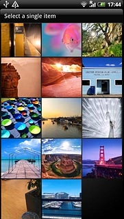 Go to the required folder.Press the required picture.