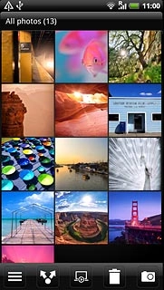 Go to the required folder.Press and hold the required picture or the required video clip until a pop-up menu is displayed.