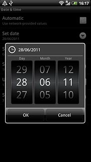 Slide the numbers up or down to set the date.
