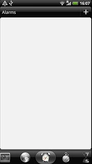 Press the alarm icon.