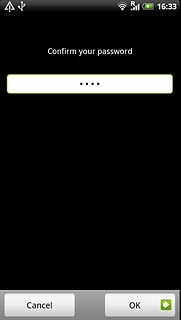 Key in the phone lock code again and press OK.