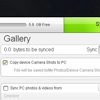 Select Copy device Camera Shots to PC to turn on the function.