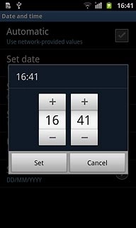 Press + or - next to hours and minutes to set the time.