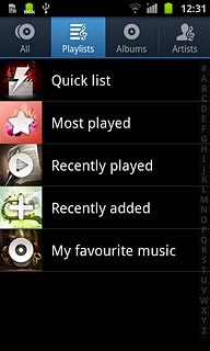 Press Playlists at the top of the display.