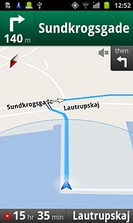 The navigation window with information about your route is displayed.The next turn and the next route detail are displayed at the top of the display.