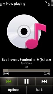 To go to the previous audio file:Press arrow left twice.