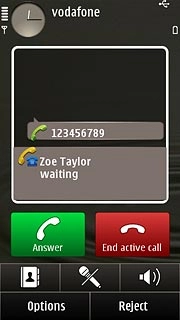 When you have an ongoing call, the new call is signalled by a sound.Press Answer.