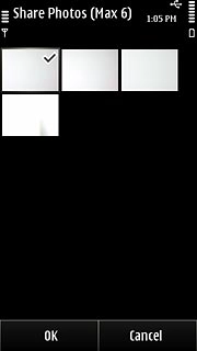 When a picture is ticked (V), it's selected.