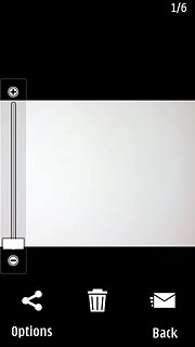 To return to the list of pictures or video clips:Press anywhere on the display.Press Back.