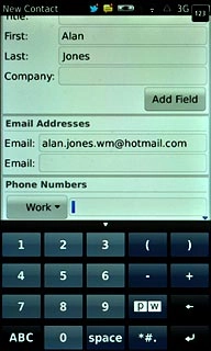 Press the field below Phone Numbers.Key in the required phone number.
