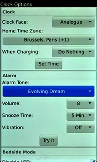 Press one of the following options:Alarm Tone
