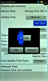 Slide hours and minutes up or down to set the time.