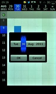 Slide date, month and year up or down to set the date.