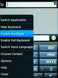 Press Enable SureType or Enable Multi-Tap (depending on the current setting).