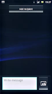 Press and hold the text input field until a pop-up menu is displayed.