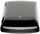 Turn the back of your phone towards you.Take hold of the bottom of the back cover and remove it.