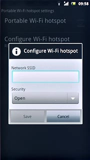 Press the field below Network SSID and key in the required name for the Wi-Fi hotspot.