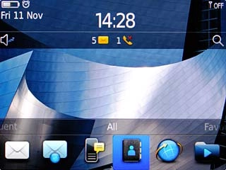 The alarm icon shows that the alarm is set.Further information:Set the alarm