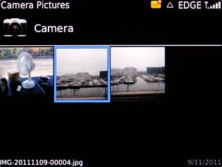 To use a saved picture:Go to the required folder.Highlight the required picture and press the Navigation key.