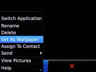 Scroll to Set As Wallpaper and press the Navigation key.