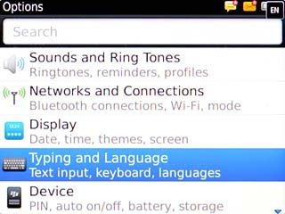 Scroll to Typing and Language and press the Navigation key.