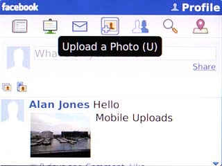 Scroll to the upload picture icon and press the Navigation key.