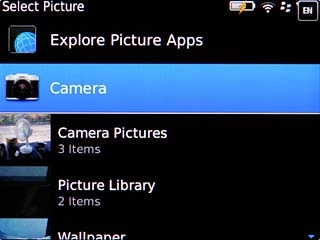 To upload a new picture:Scroll to Camera and press the Navigation key.