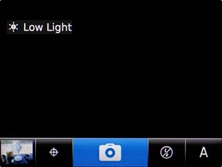 Scroll to the camera icon and press the Navigation key to take the picture.Key in text for the picture.