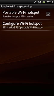 When the box next to the menu item is ticked (V), the Wi-Fi hotspot is turned on.