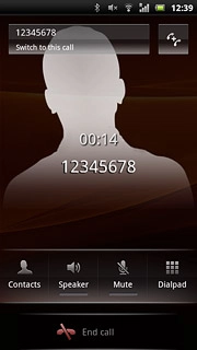 The active call is displayed at the centre of the display.Press Switch to this call to activate the call on hold.