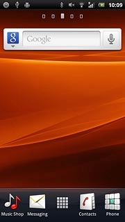 To return to the music player:Press the menu icon.