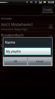 Press the text input field and key in a name for the playlist.