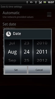 Slide month, date and year up or down to set the date.