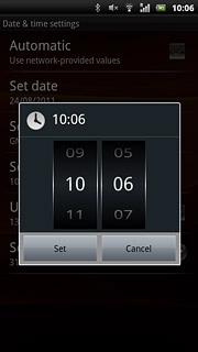 Slide hours and minutes up or down to set the time.