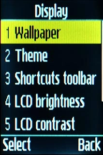 Scroll to Wallpaper and press the Navigation key.
