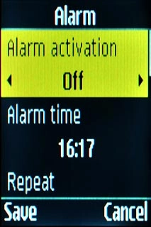 Scroll to Alarm activation and press Navigation key right to select On.