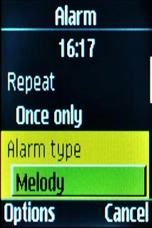 Scroll to Alarm type and press the Navigation key.