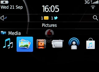 Press Pictures or Videos.Go to the required folder.