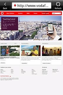 Press the address bar at the top of the display.