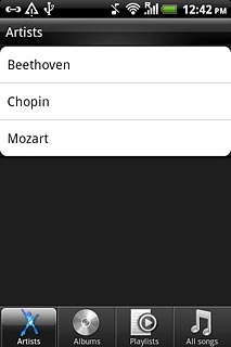 Press the required category at the bottom of the display.Go to the required audio file or playlist.