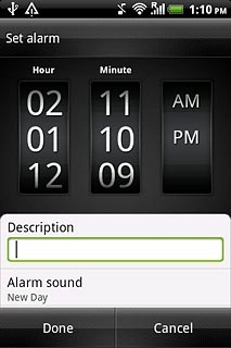 Slide the numbers up or down to set Hour and Minute.