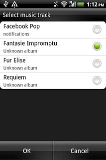 Once you've found an alarm tone you like, press OK.