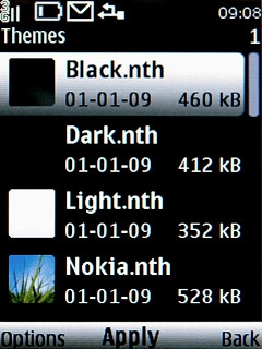 Highlight the required theme and press the Navigation key.