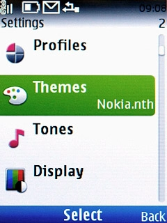 Scroll to Themes and press the Navigation key.