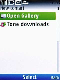 Scroll to Open Gallery and press the Navigation key.Go to the required folder.