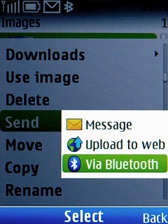 Scroll to Via Bluetooth and press the Navigation key.