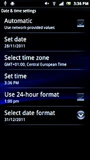 Press Automatic to turn automatic date and time update on or off.
