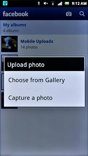 To upload a saved picture:Press Choose from Gallery.