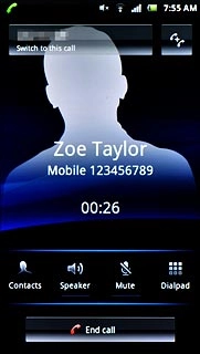 The active call is displayed at the centre of the display.Press Switch to this call to activate the call on hold.